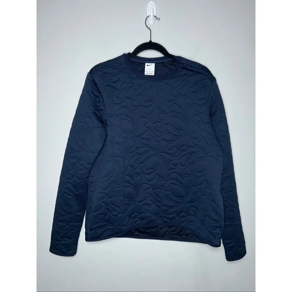 Nike Women's Dri-FIT Long-Sleeve Golf Mid Layer pullover in navy blue with a sub